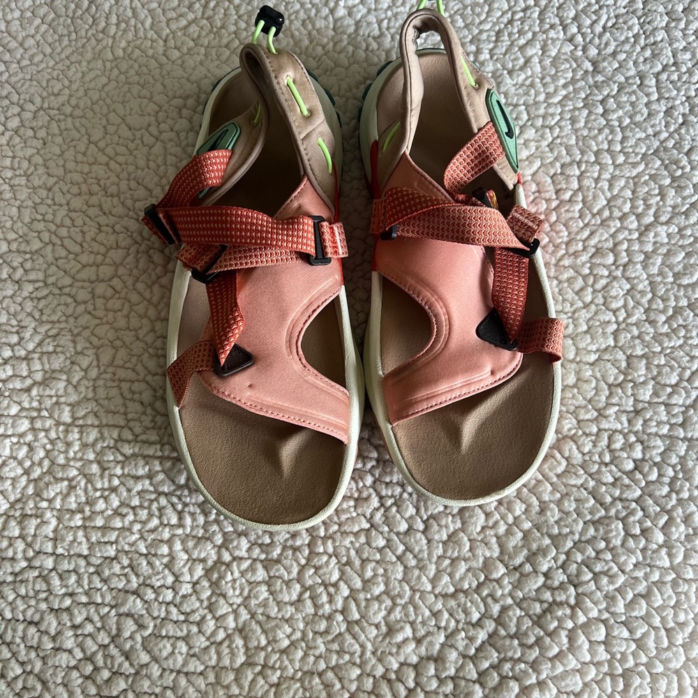 Women’s  Pink and Green Nike hiking Sandals